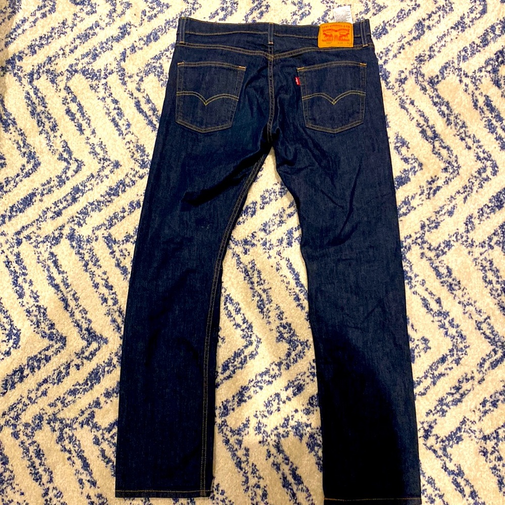 Levi’s 513 straight leg dark blue jeans